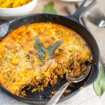 Bobotie? Uma Sinfonia de Sabores Picantes e Suaves em uma Cama Quente de Especiarias!