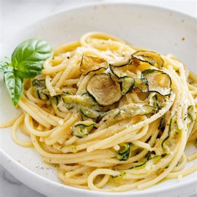 Spaghetti alla Nerano! A symphony of fried zucchini and tangy Provolone del Monaco cheese!